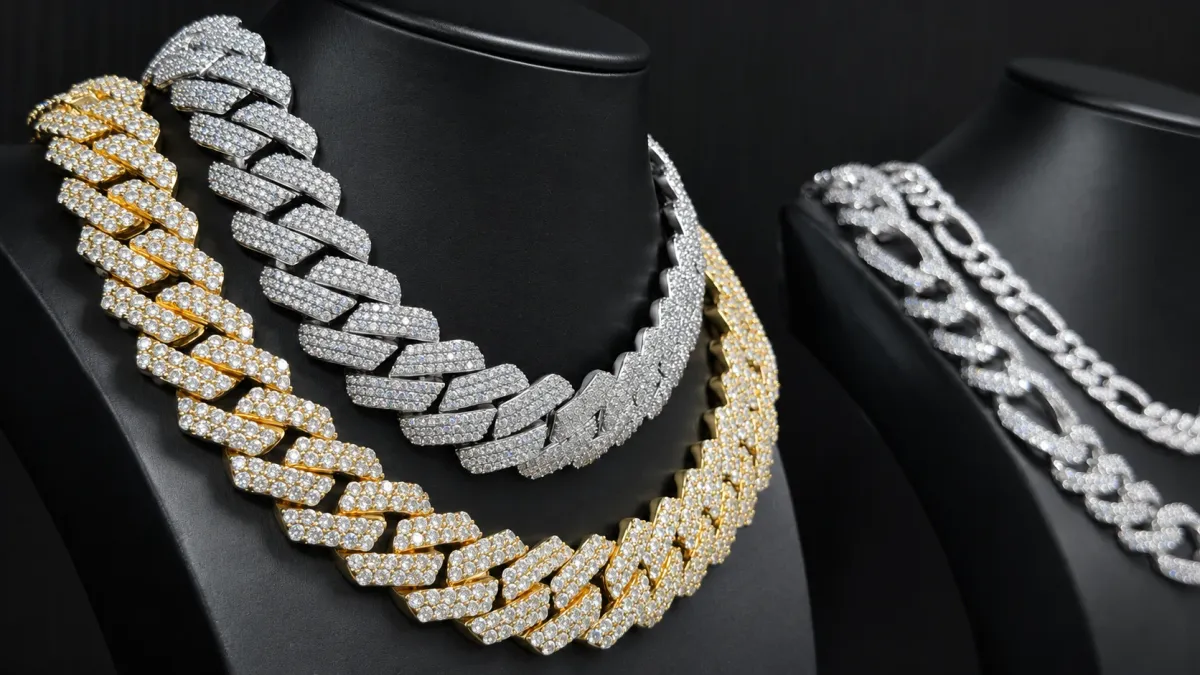 Close-up of gold-tone and silver-tone stone-set Cuban links in our sample room
